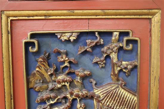 A Chinese gilt and red lacquered relief panel 84 x 32cm